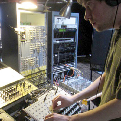 Carl Diehl working with technology to produce sound and video