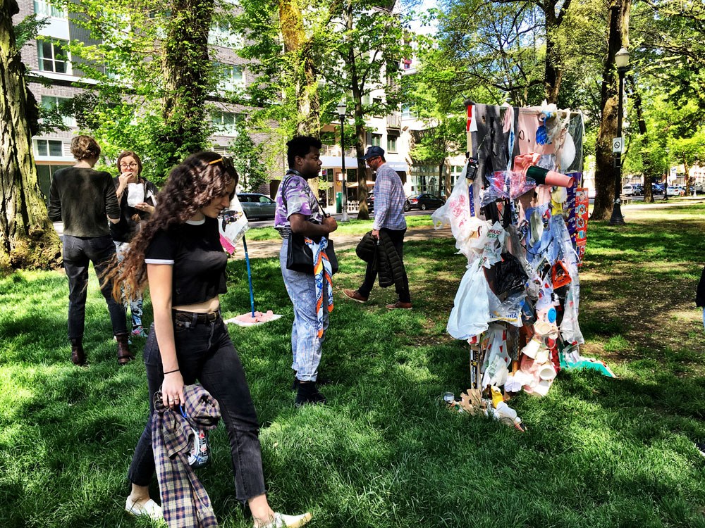 PNCA students performing a Class Critique in the North Blocks park by PNCA