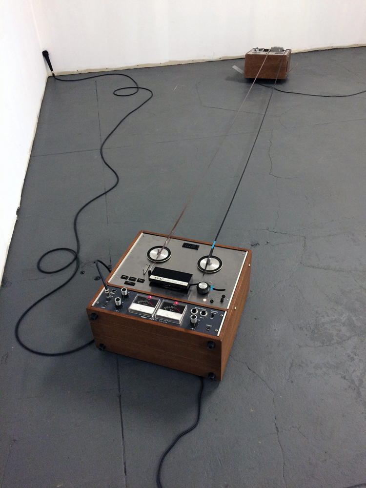 Vintage audio tape player arranged on the floor as part of Skylar Leaf's thesis project at Pacific Northwest College of Art (PNCA). 