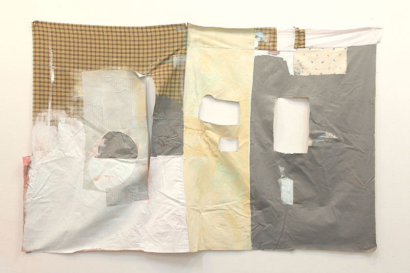 Madé Tavernier painting of various warm tones of white, cream and gray fabrics with cut away spaces, sewn together.