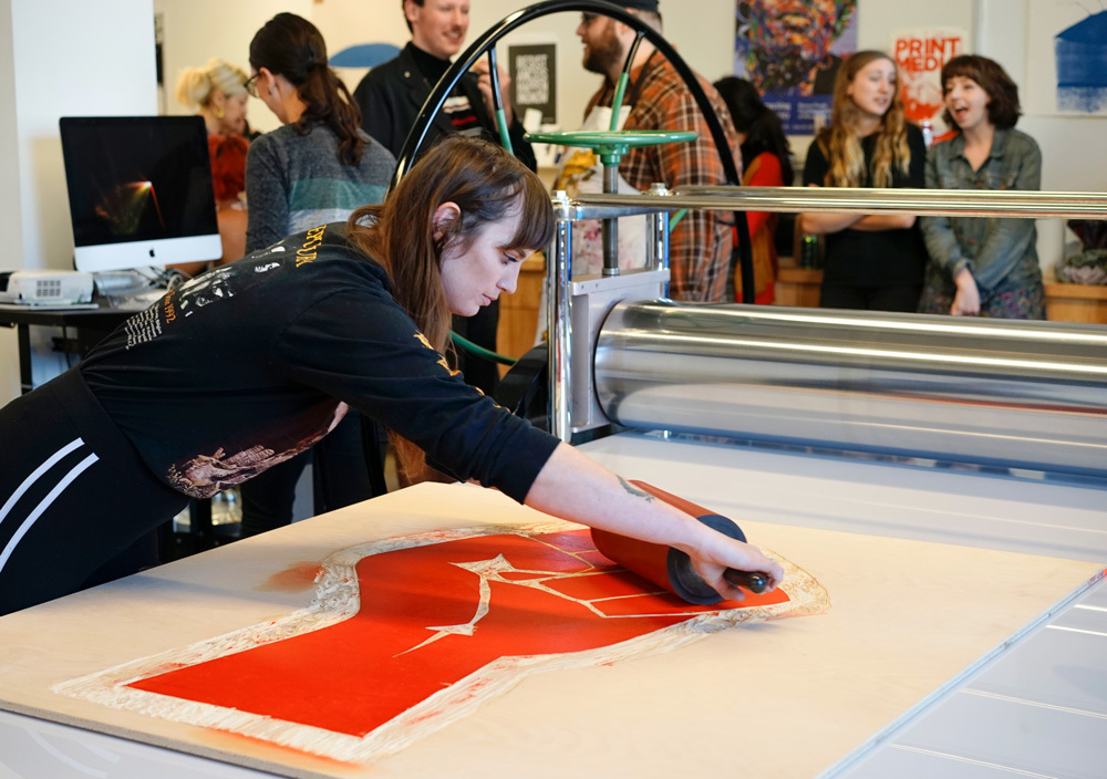 Printmaking Resist Fist Student Working