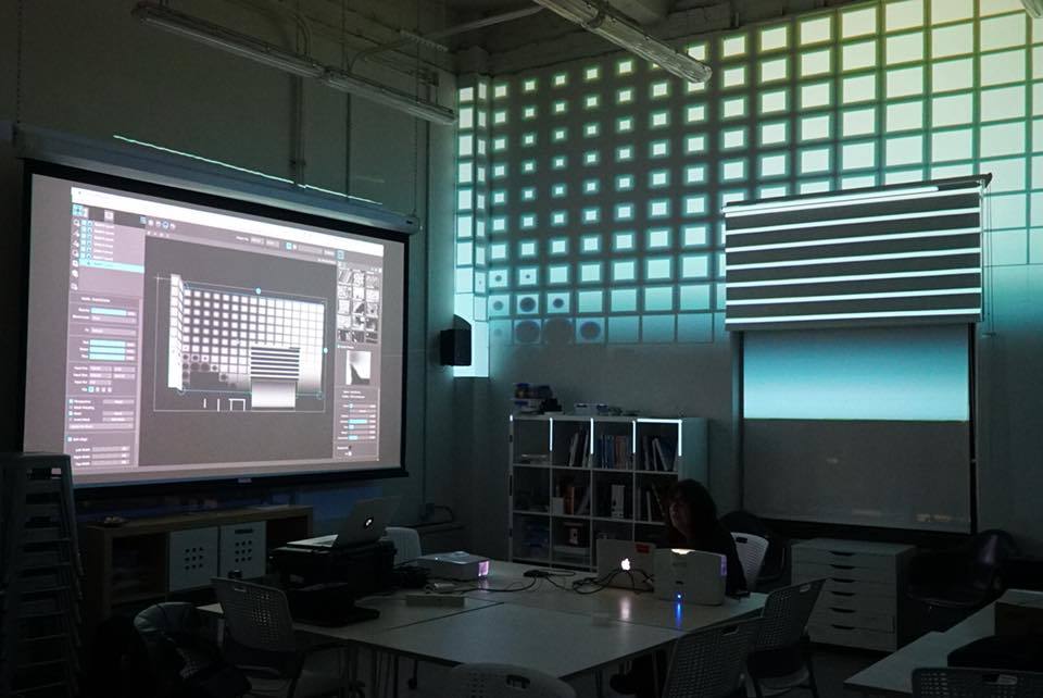 geometric pattern projected on wall for projection mapping workshop, Make+Think+Code at PNCA