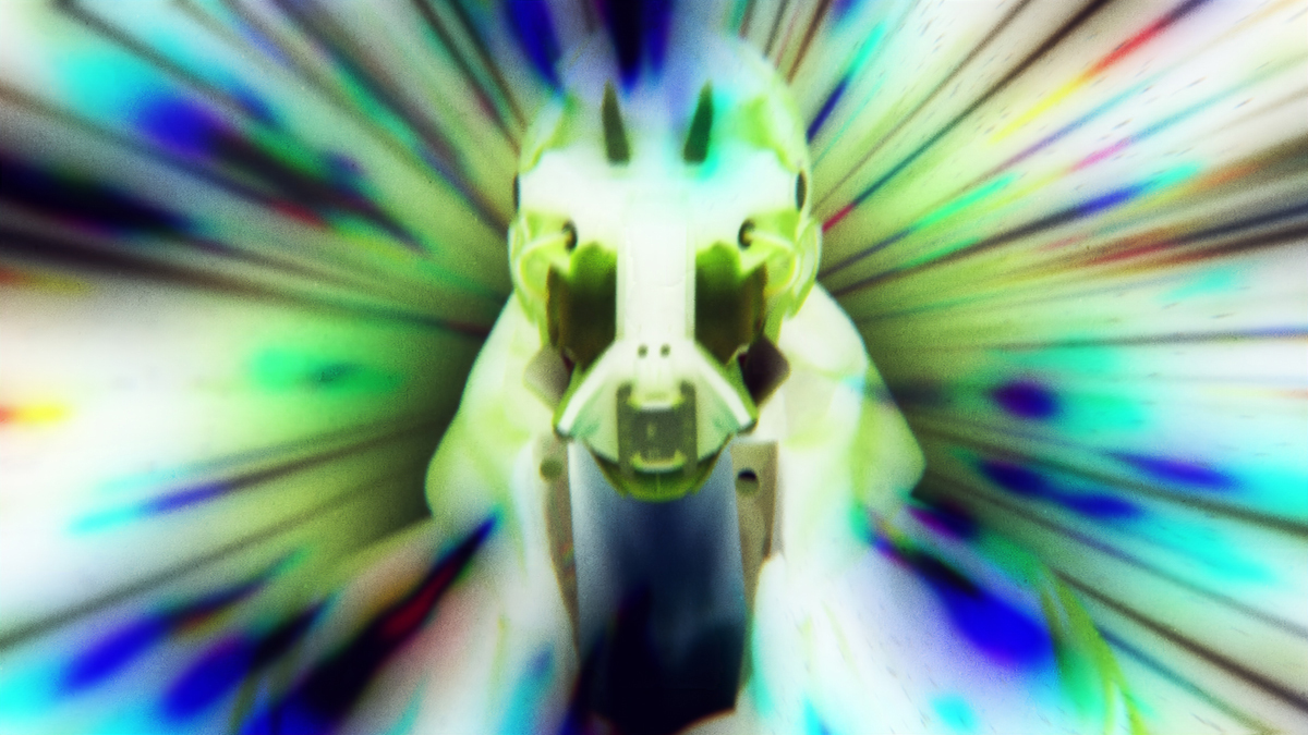 Video still of Trung Bao's video installation, a figure wearing a mask with a inverted contrast filter